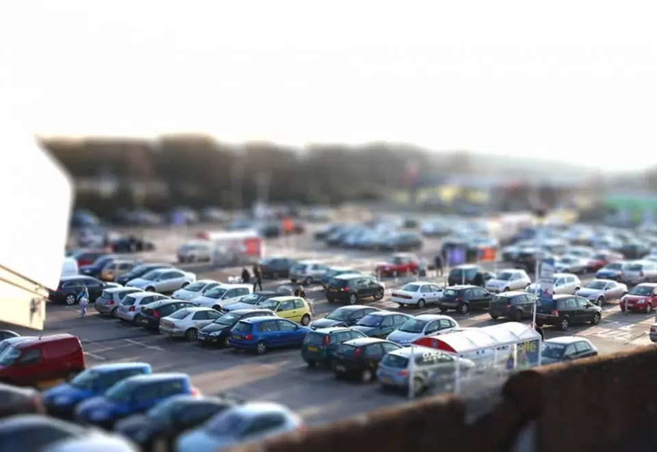 Tilt-shift shot of a car park