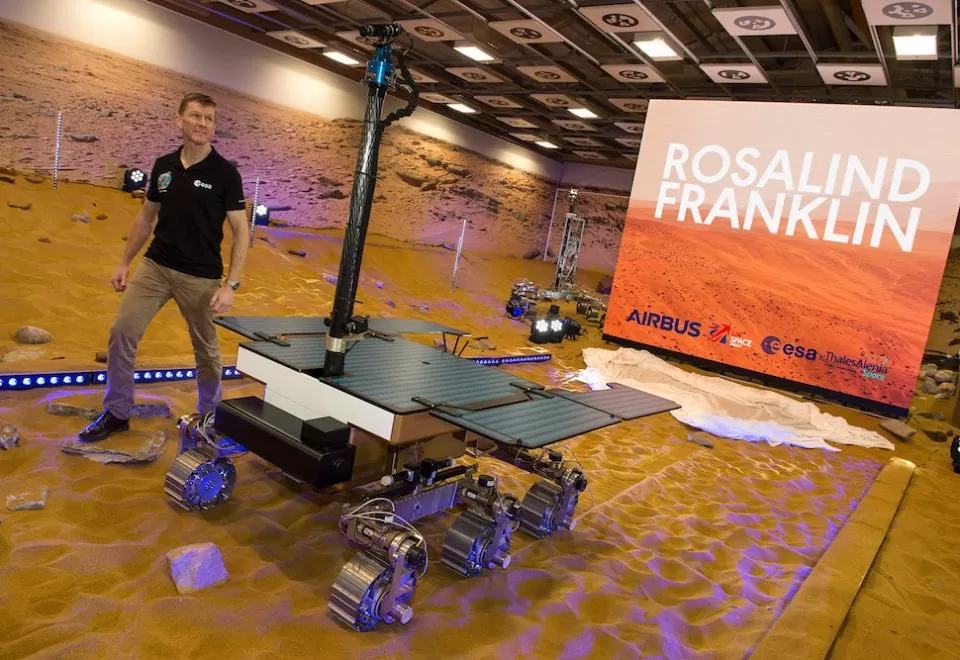Tim Peake stands alongside newly-named Rosalind Franklin rover in Mars simulation environment during naming ceremony ahead of space mission