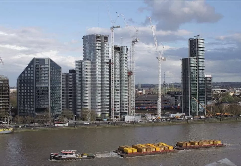 Construction progress on Albert Embankment from across the Thames, central London.