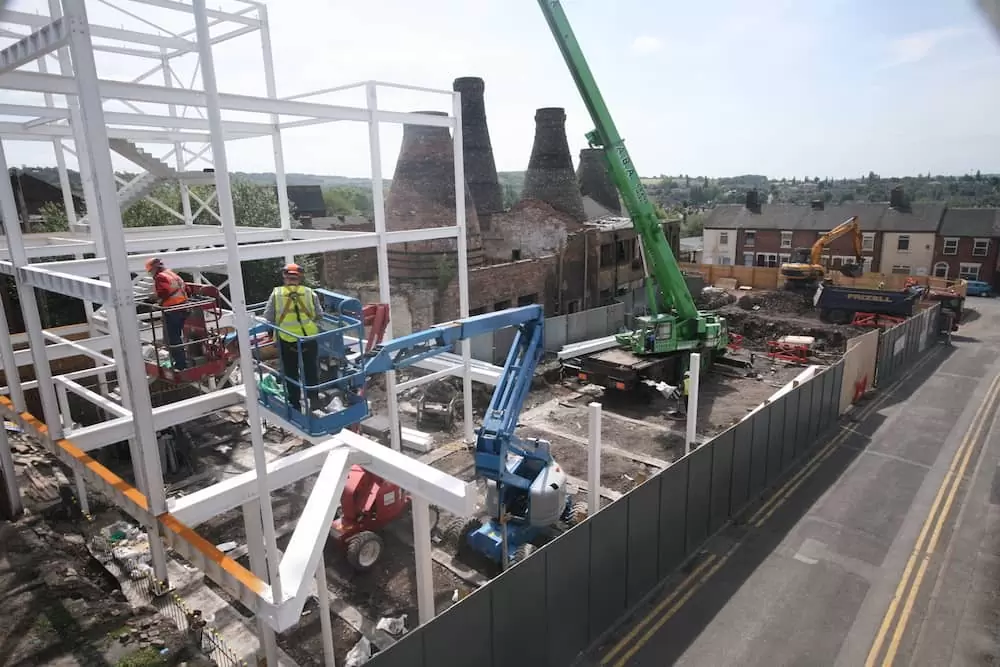 Construction of new structure at the old Enson works in Normacot, Stoke-on-Trent. Four bottle kilns are preserved, visible in the background of the shot.