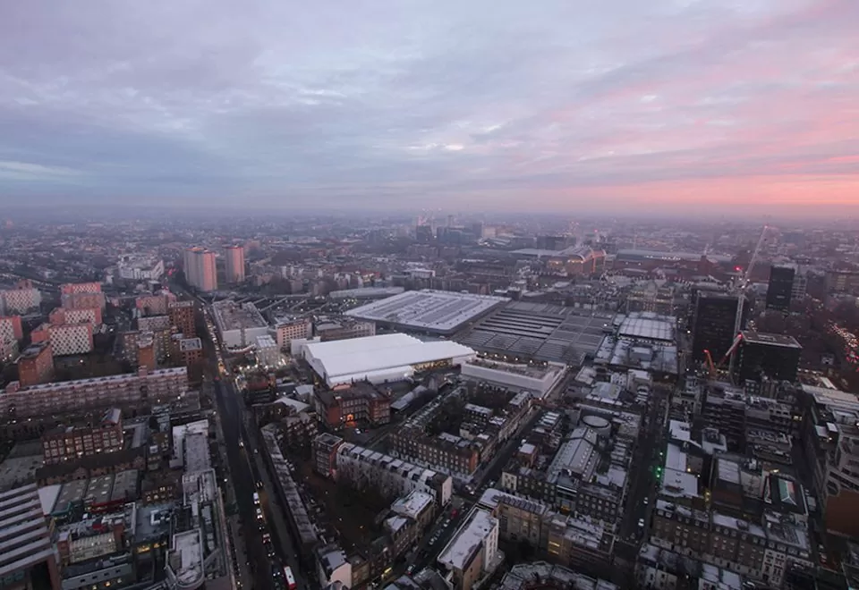 Sunrise over Euston Station and the surrounding Central London area, overlooking the ongoing HS2 works on multiple construction sites