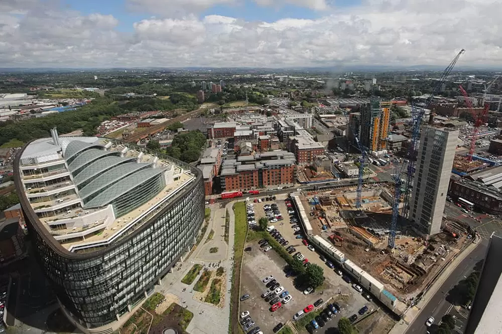 Aerial view of the NOMA development in Manchester, focusing on Angel Gardens.
