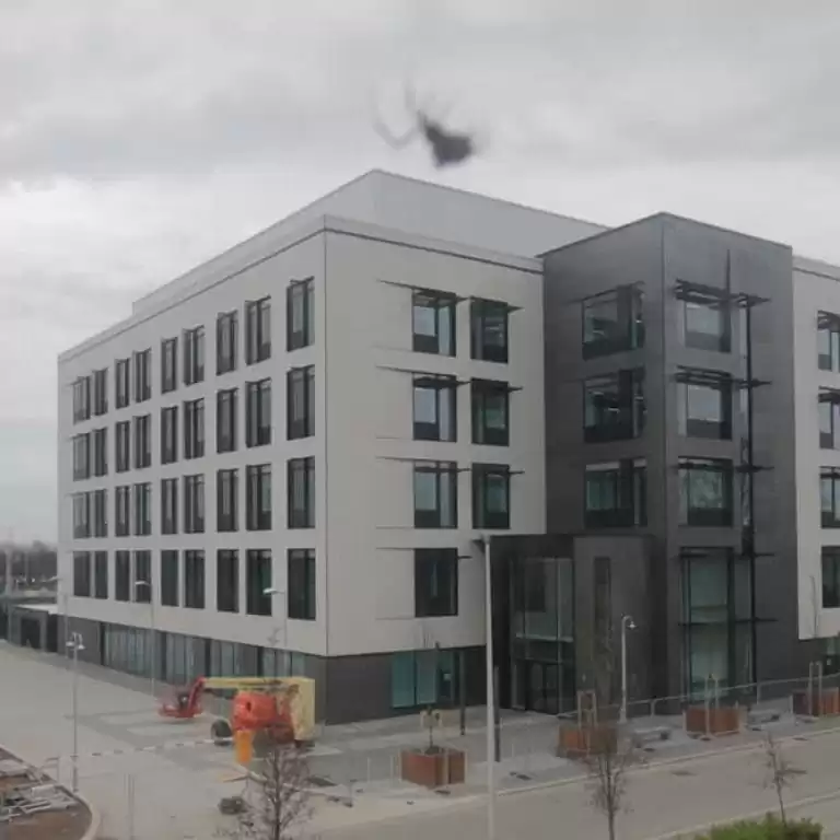 Spider spins a web on our camera system capturing The West Brom building society headquarters build