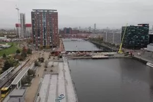 Rooftop view from the BBC building overlooking construction progress at Salford Quays.