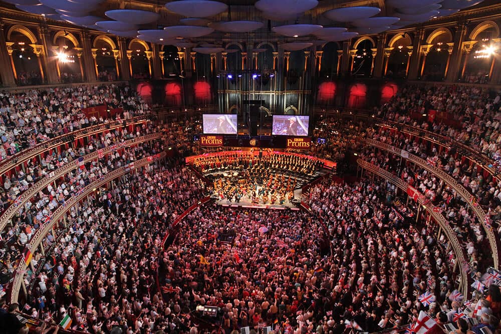 The Royal Albert Hall showing the full auditorium and the vast number of audience attendees. The Time-lapse of theatres. 