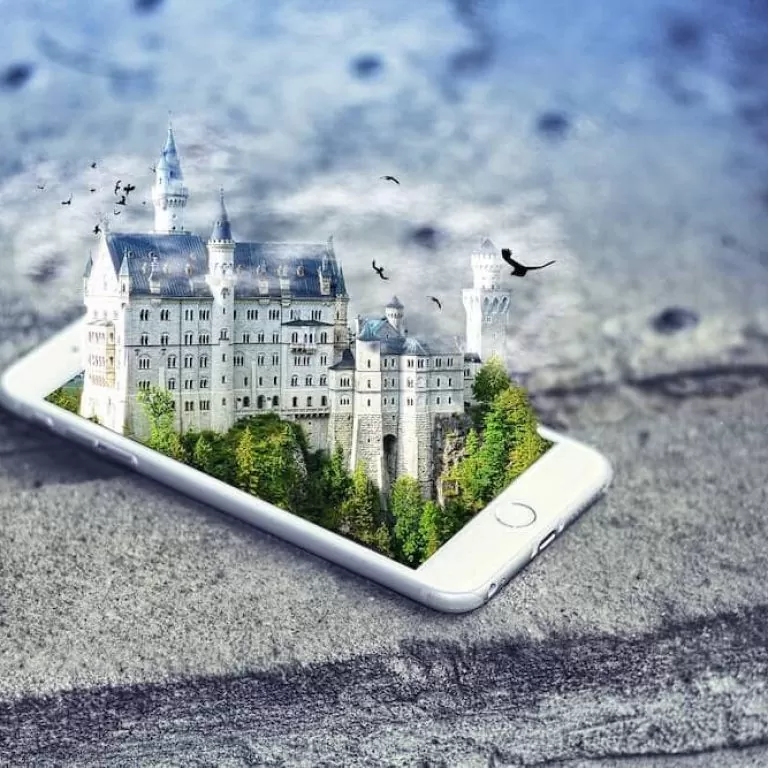 An idyllic castle emerging from the screen of an iPhone - depicting a virtual reality.