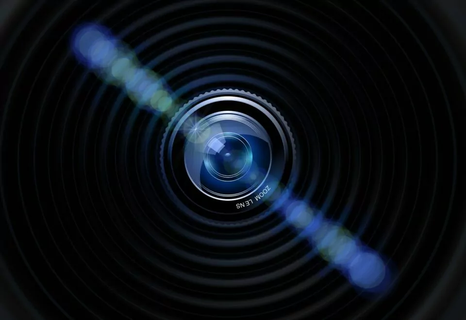 A close-up image showing the lens of a camera. What is Time-Lapse?